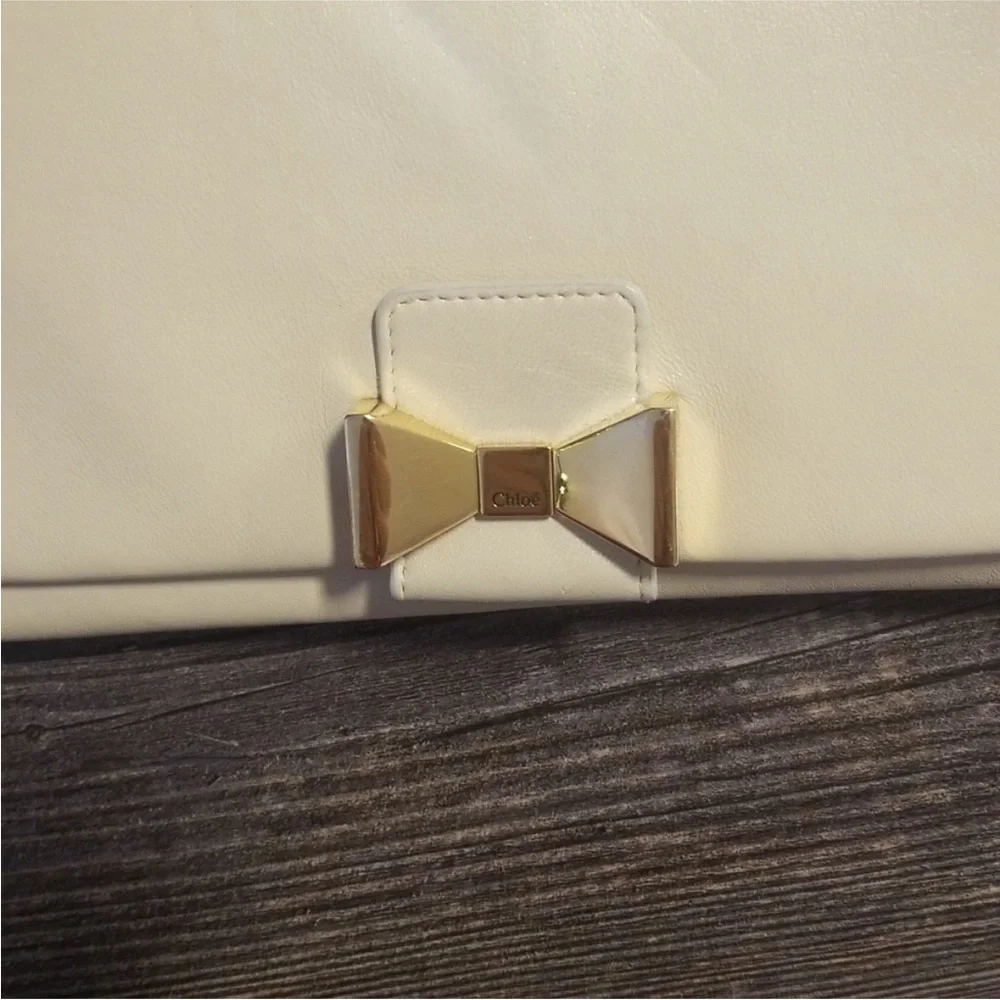 Chloé Chloe Gold Bow Cream Leather Clutch or Crossbody Bag
